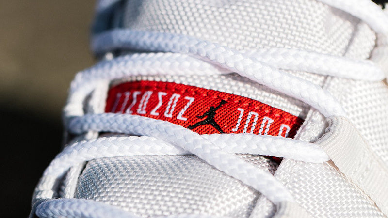 Jordan Air Jordan 11 Platinum Tint White Red Sneakers