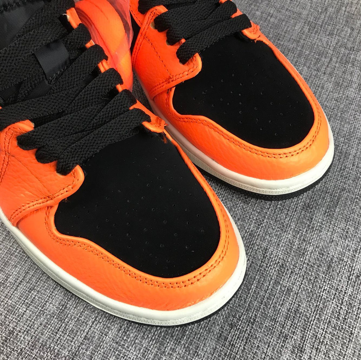 Jordan Air Jordan 1 Mid Orange Black Sneakers
