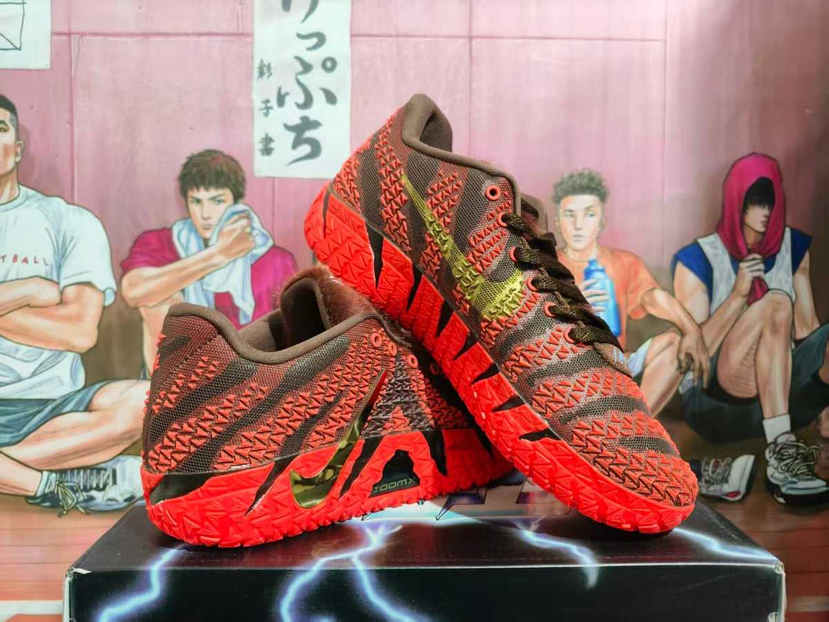 Nike Red Basketball Sneakers with Black and Orange Details