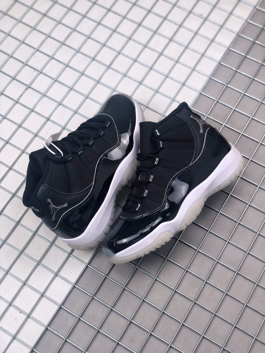 Jordan Air Jordan 11 Silver Eyelets Black White Sneakers