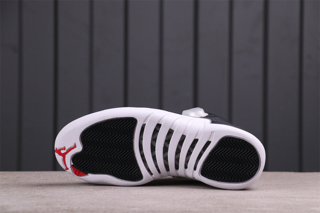 Jordan Air Jordan 12 Reverse Taxi Sneakers Black White 130690-001