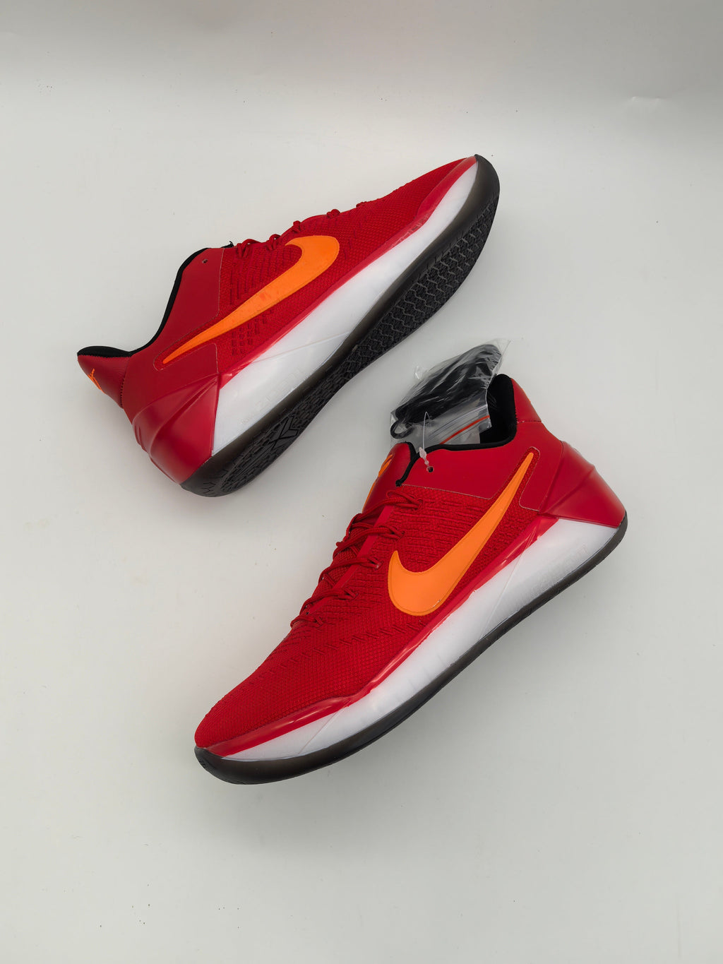 Nike Red Basketball Sneakers with Orange Swoosh