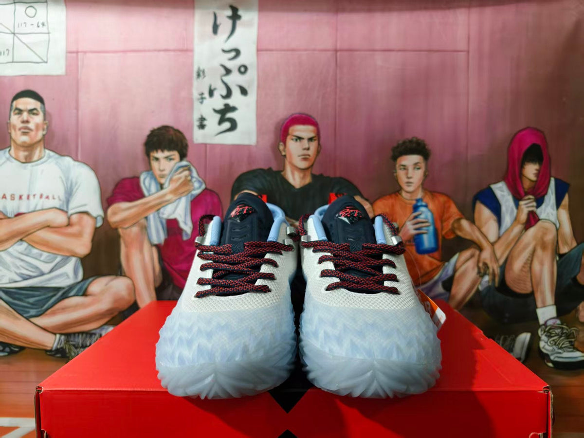 Nike White and Blue Basketball Sneakers with Red Accents