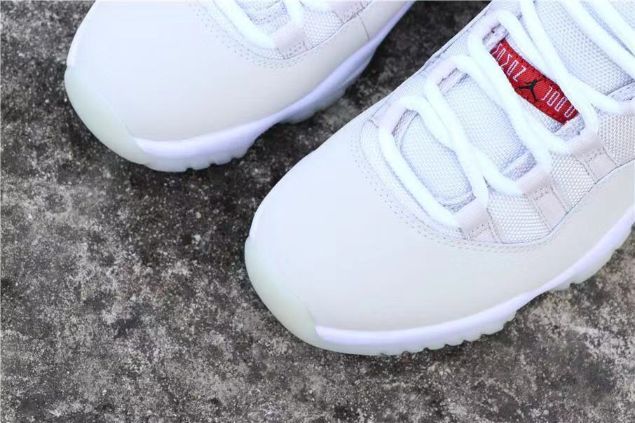 Jordan Air Jordan 11 Platinum Tint White Red Sneakers