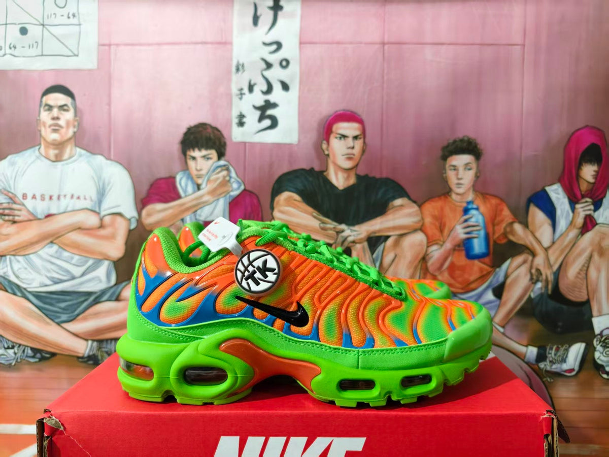 Nike Air Max Plus Sneakers in Orange and Green
