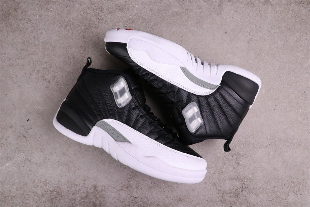 Jordan Air Jordan 12 Reverse Taxi Sneakers Black White 130690-001