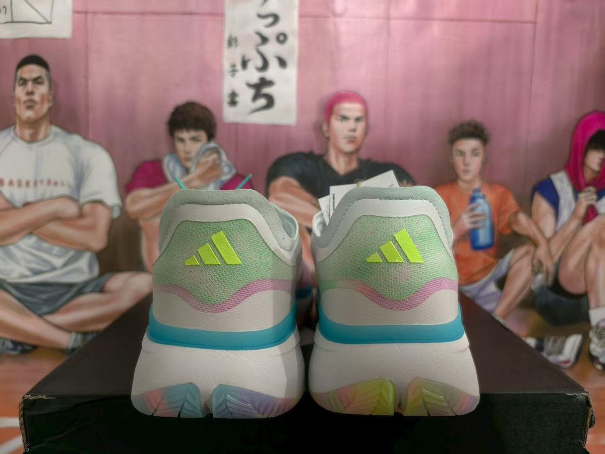 Adidas White and Blue Basketball Sneakers with Multicolor Accents