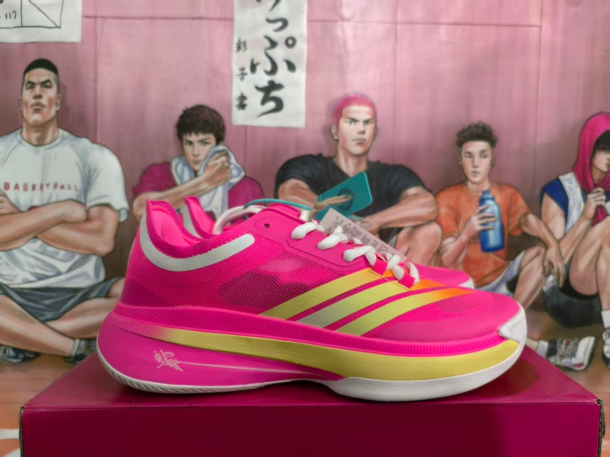 Pink Basketball Shoes with Metallic Gold Accents