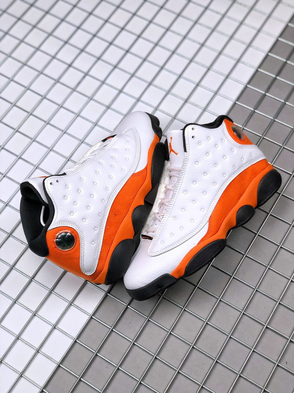 Jordan Air Jordan 13 Starfish White and Orange Sneakers