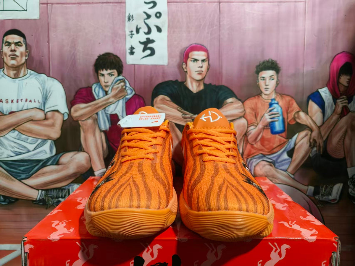 Nike Orange Basketball Sneakers with Animal Graphics