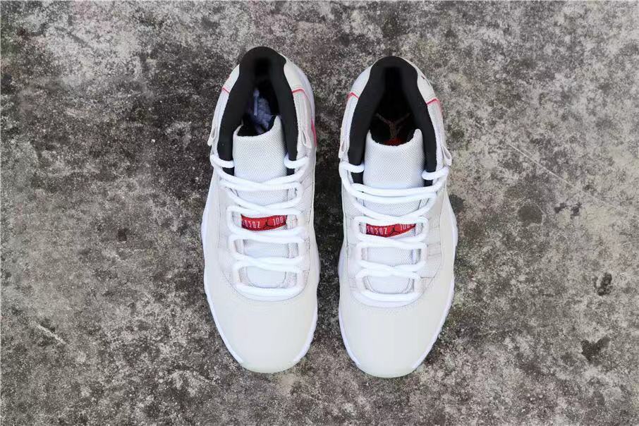 Jordan Air Jordan 11 Platinum Tint White Red Sneakers