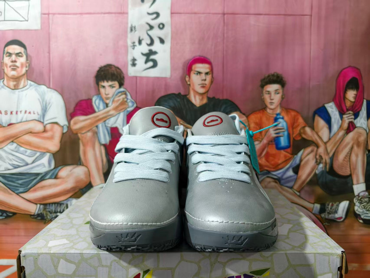 Nike Gray Low-Top Sneakers with Metallic Swoosh