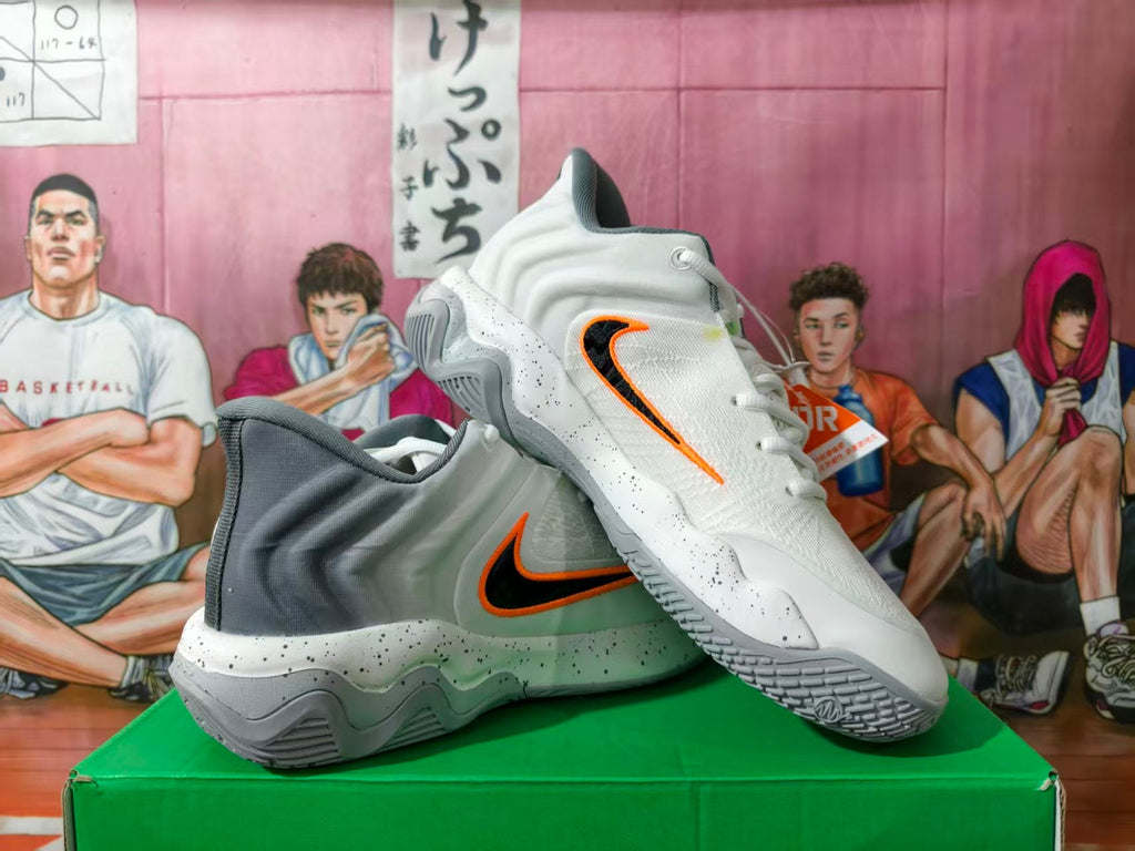 Nike Basketball Sneakers in Gray and White with Orange Swoosh