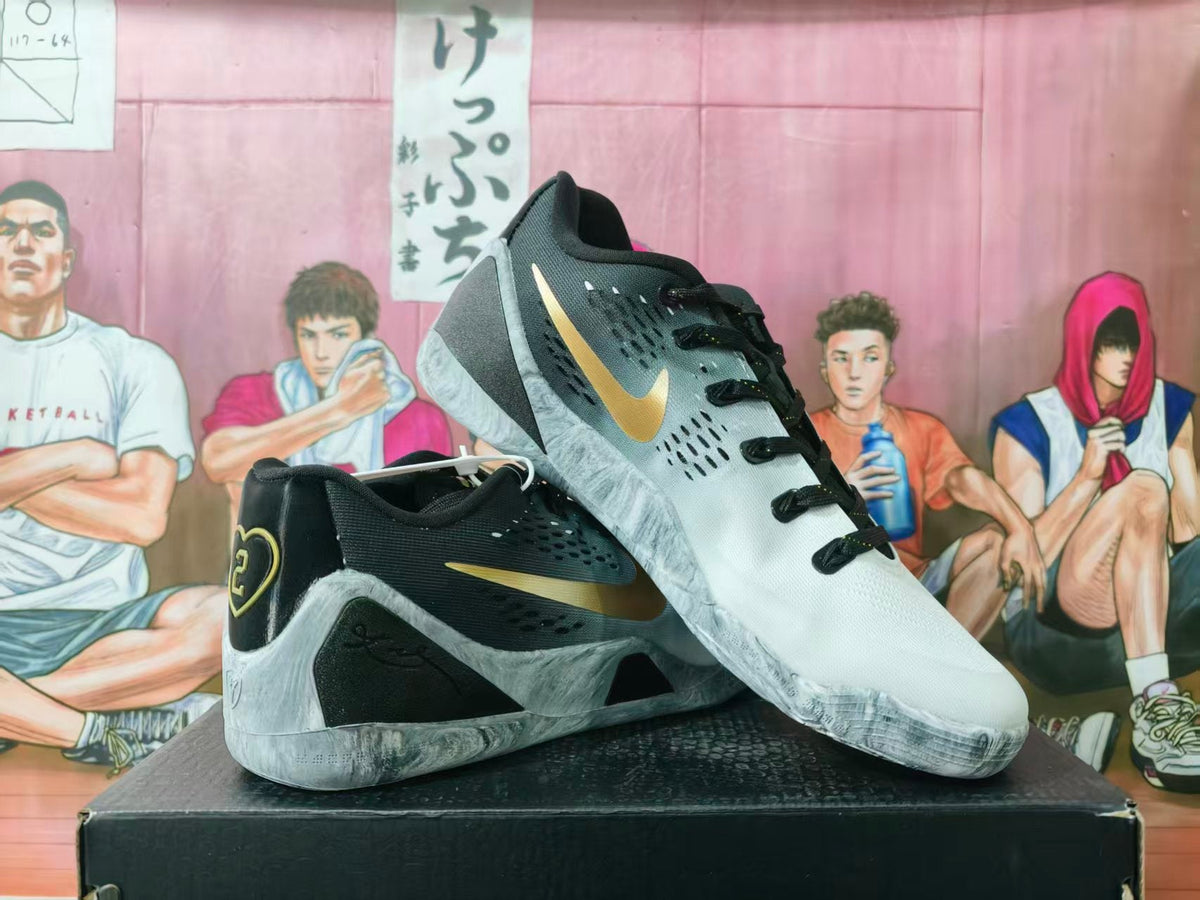 Nike Black and White Basketball Sneakers with Gold Accents
