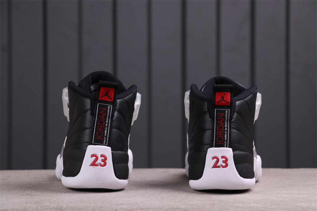 Jordan Air Jordan 12 Reverse Taxi Sneakers Black White 130690-001