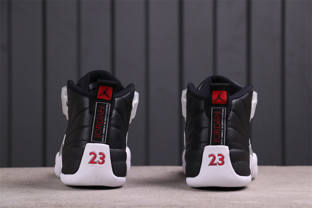 Jordan Air Jordan 12 Reverse Taxi Sneakers Black White 130690-001