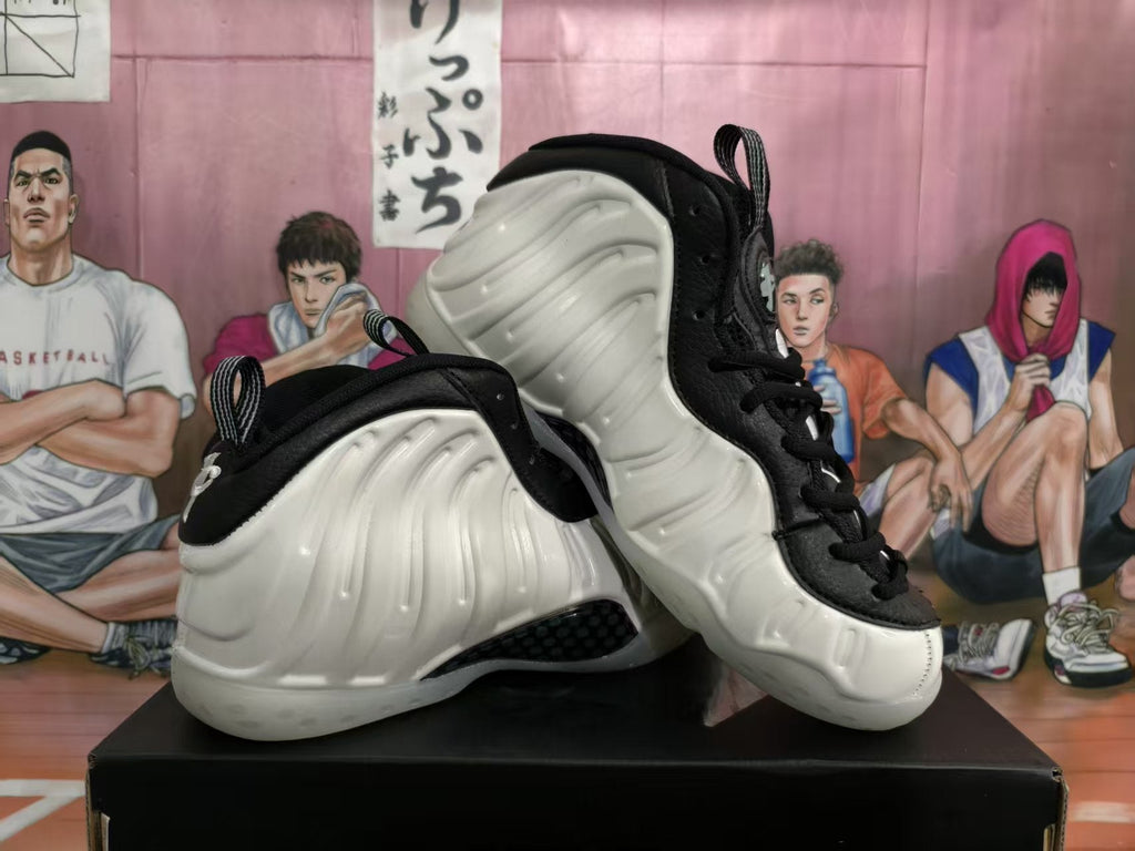 White and Black High-Top Basketball Sneakers