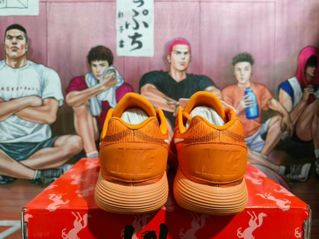 Nike Orange Basketball Sneakers with Animal Graphics