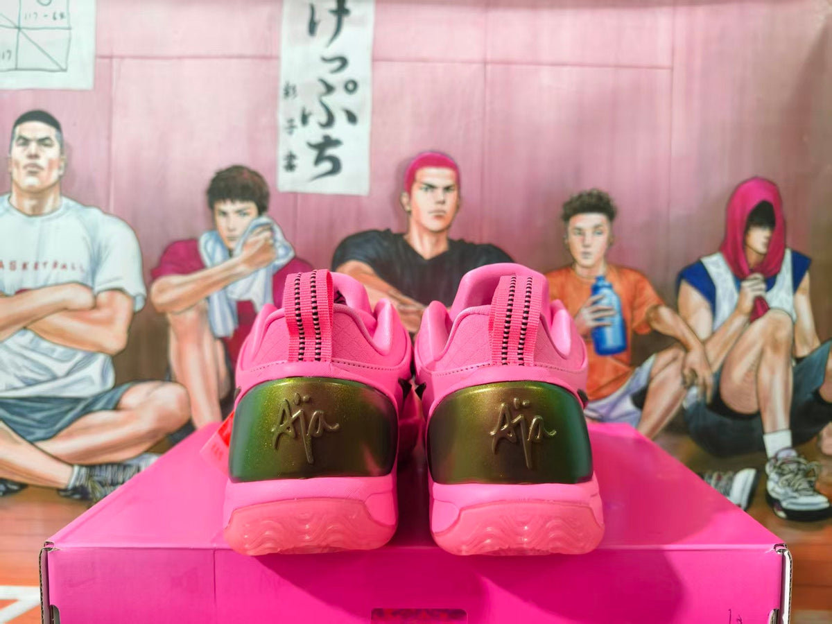 Nike Pink Basketball Sneakers with Metallic Gold Accents