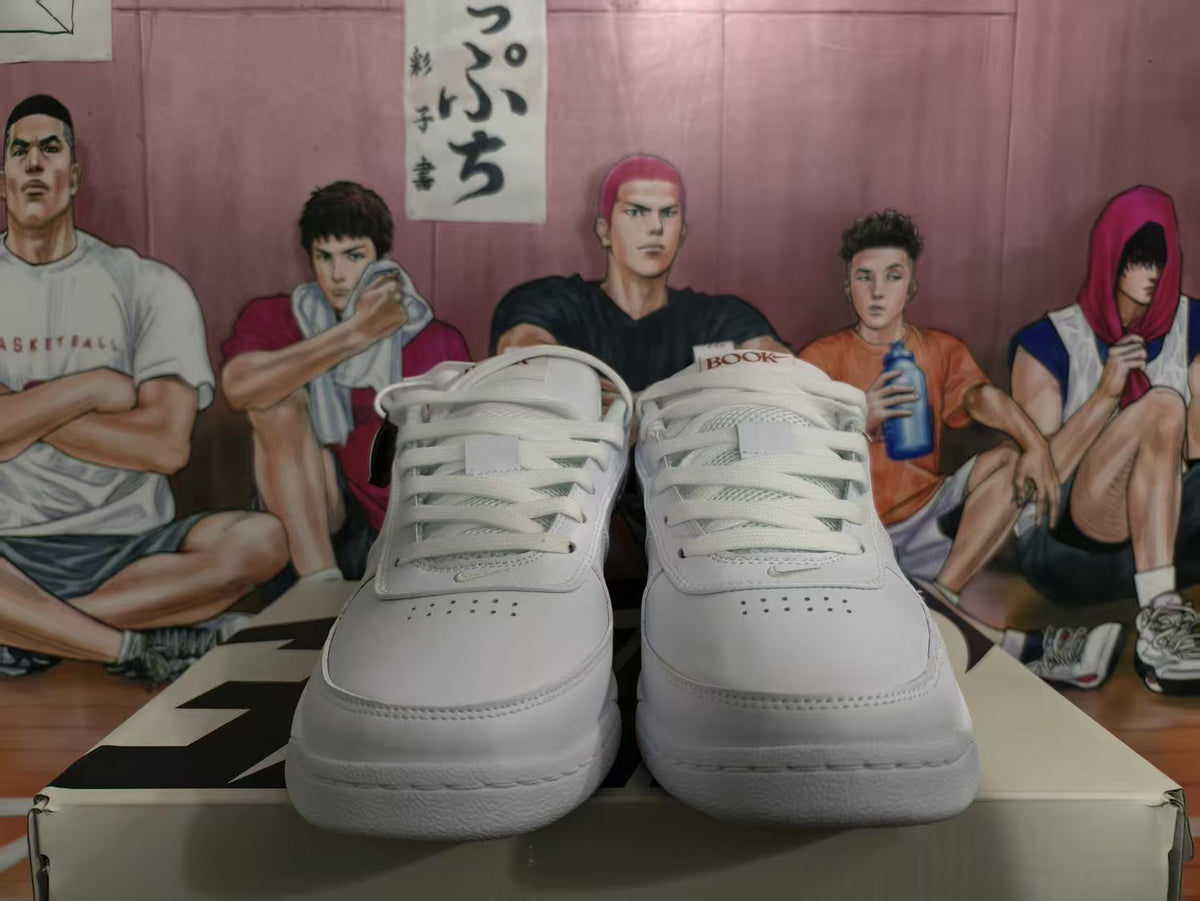 Nike White Low-Top Sneakers with Patterned Swoosh