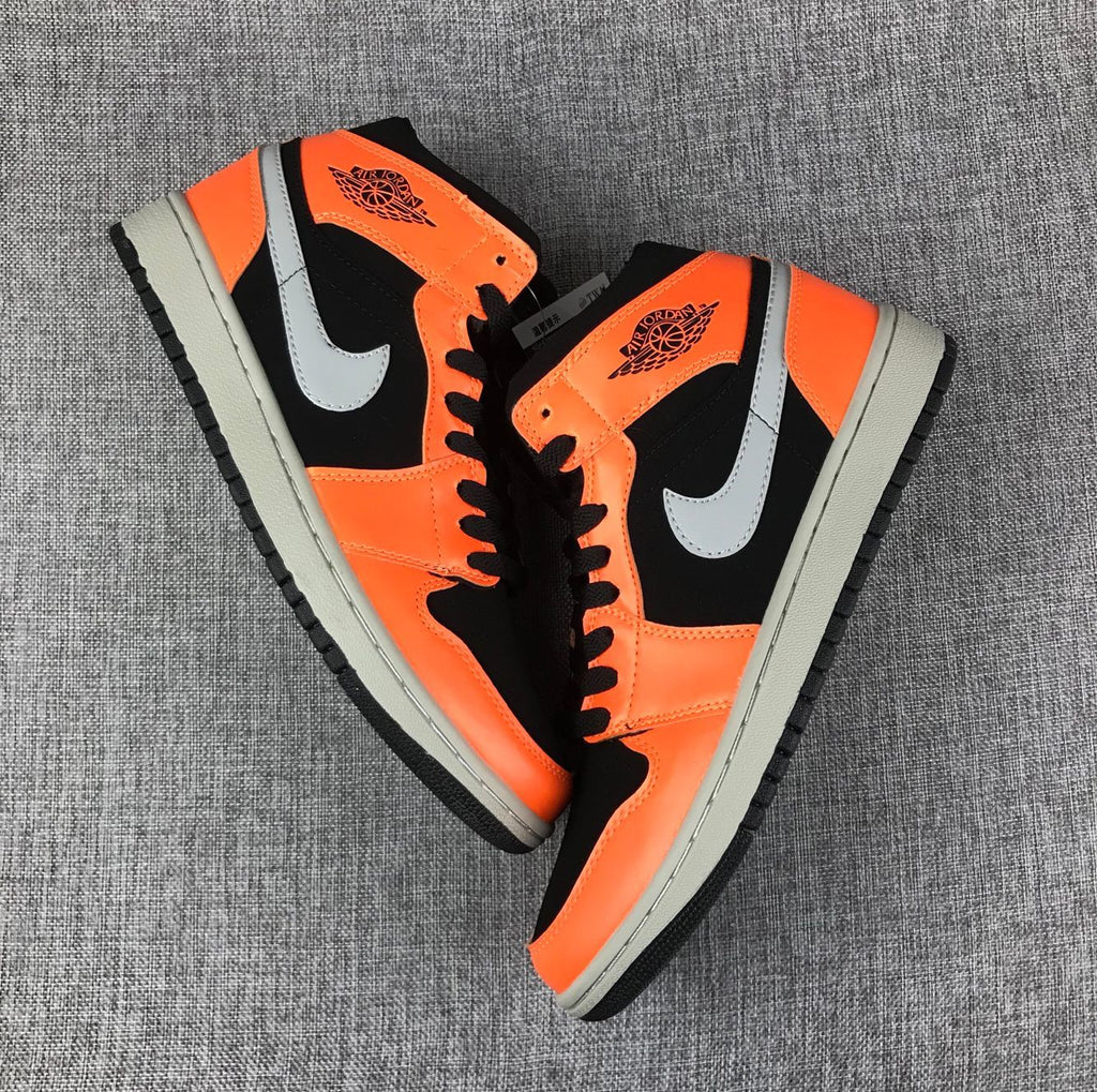 Air Jordan 1 Mid Sneakers in Black, Orange and Grey 554724-062