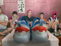 Blue Low-Top Sneakers with Red and Gray Details