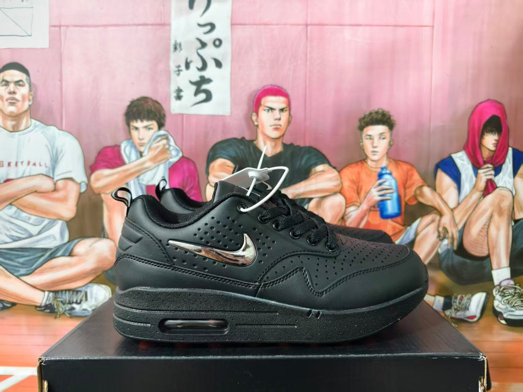 Nike Black Low-Top Sneakers with Metallic Swoosh