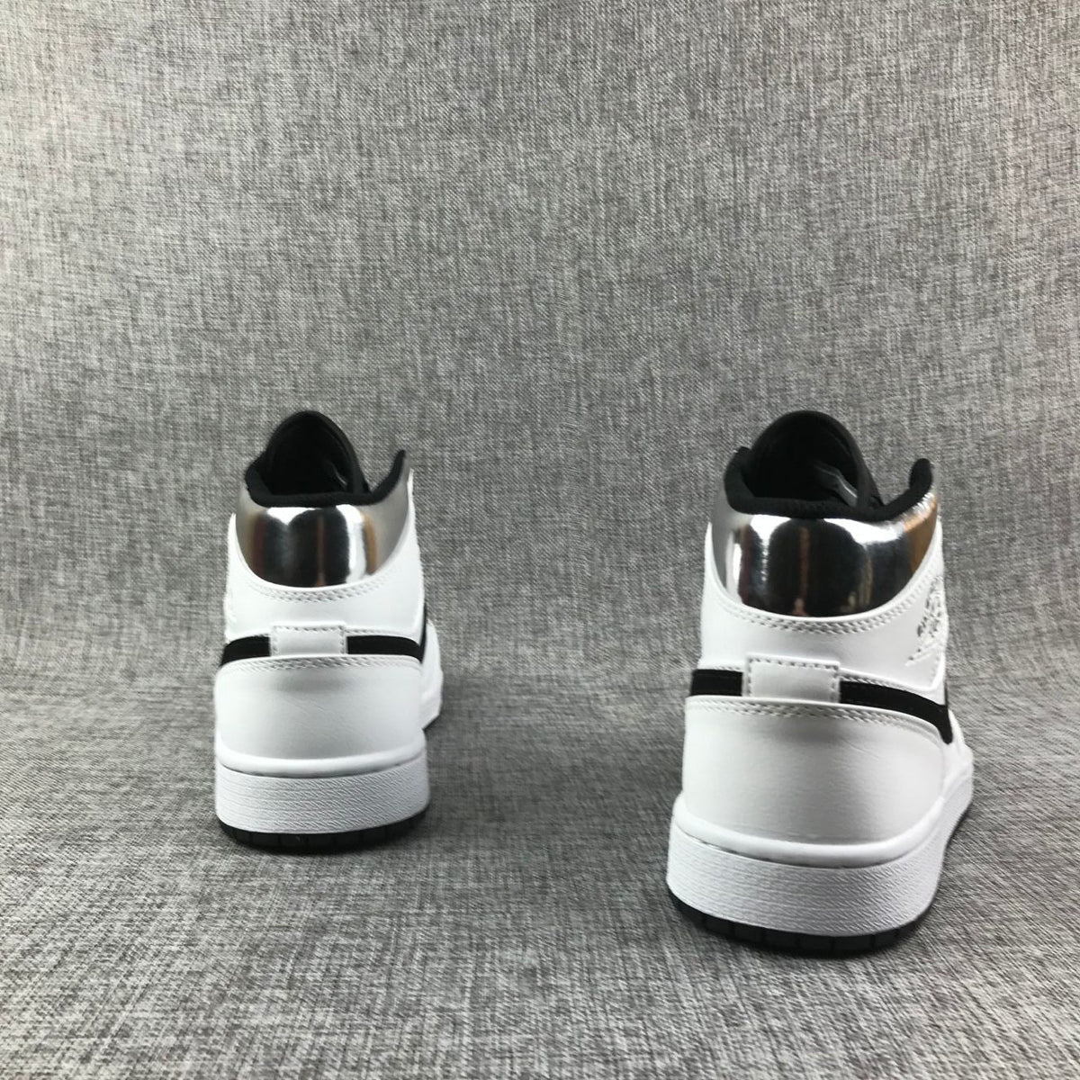 Jordan Air Jordan 1 Mid White Black Metallic Silver Sneakers