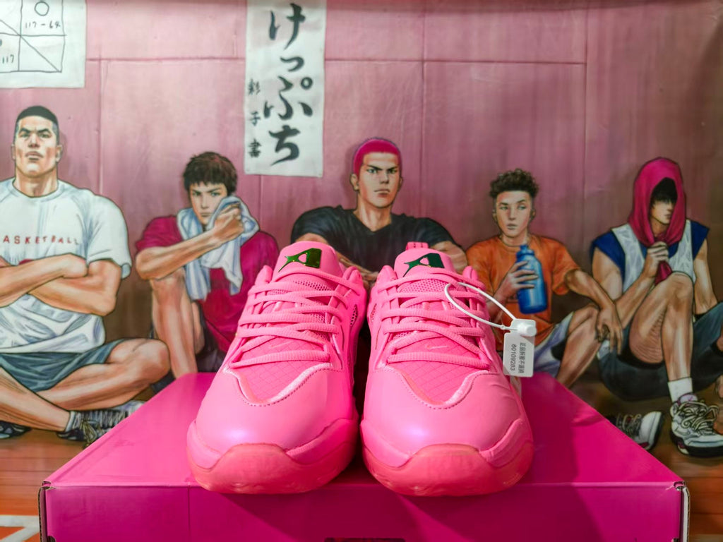 Nike Pink Basketball Sneakers with Metallic Gold Accents